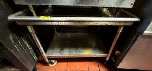 STAINLESS TABLE ON WHEELS