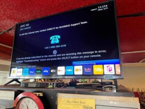 LG 50" FLAT SCREEN TV W/ MOUNT AND REMOTE.