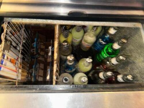 CONTENTS OF BAR COOLER - APPROX 12 OPEN BOTTLES AND (3) PARTIAL CASES OF BOTTLE BEER.