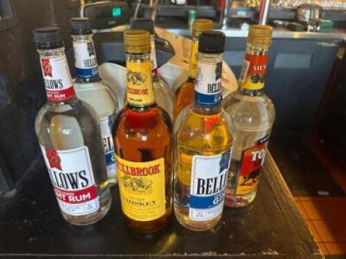 (7) UNOPENED BOTTLES OF ALCOHOL
