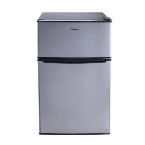 DESCRIPTION: (1) TWO DOOR MINI FRIDGE WITH FREEZER BRAND/MODEL: GALANZ #GL31S5E INFORMATION: STAINLESS RETAIL$: $169.00 SIZE: 3.1 CU FT QTY: 1