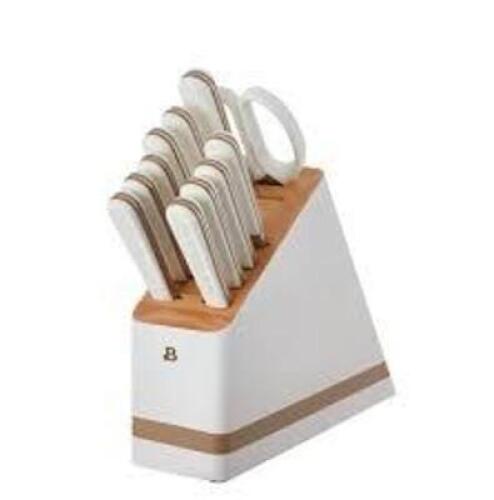 DESCRIPTION: (1) TWELVE PIECE KNIFE SET BRAND/MODEL: BEAUTIFUL #045908135652 INFORMATION: WHITE RETAIL$: $100.00 QTY: 1