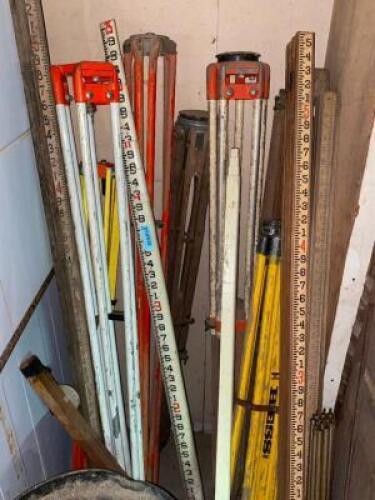 DESCRIPTION (3) TRIPOD STANDS AND (2) MEASURING STICKS LOCATION WAREHOUSE 1 QTY 1