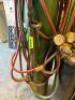 DESCRIPTION: OXYGEN ACETYLENE WELDING TANK PACKAGE WITH (2) FULL TANKS AND (2) PARTIAL TANKS, HOSE, AND TORCH QTY: 1 - 2