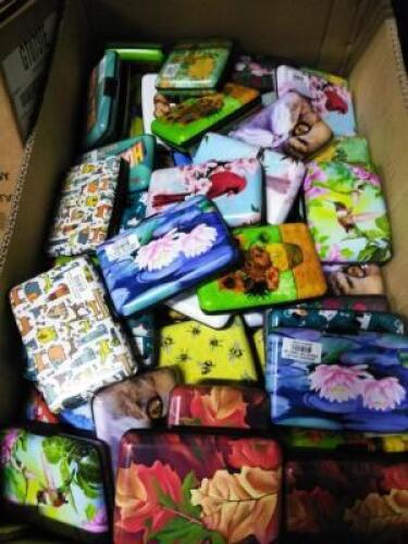 DESCRIPTION: (1) CASE OF APPROX (50) METAL WALLETS BRAND/MODEL: ARMORED WALLET INFORMATION: MANY DESIGNS QTY: 1