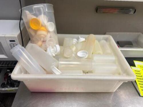 DESCRIPTION PLASTIC TOTE AND CONTENTS - ASSORTED PLASTIC SQUEEZE BOTTLES ADDITIONAL INFORMATION W/ LIDS THIS LOT IS: ONE MONEY LOCATION KITCHEN QTY 1