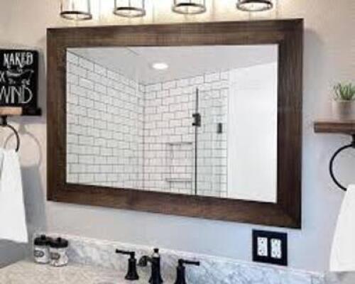 DESCRIPTION: (2) FRAMED MIRROR BRAND/MODEL: MASTERPIECE DECOR INFORMATION: JAVA, STAINED WOOD SIZE: 22.5" X 28.5" RETAIL$: $120.99 EA QTY: 2