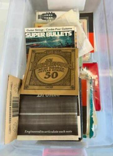 BIN OF ACOUSTIC GUITAR STRINGS SINGLES & SETS