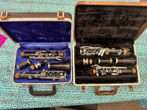 (2)- PLASTIC BUNDY CLARINETS