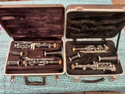 (2)- PLASTIC CLARINETS