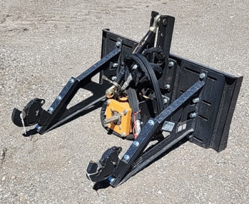 DESCRIPTION: SKID STEER QUICK HITCH ATTACHMENT BRAND/MODEL: WOLVERINE PHA-15-02C RETAIL$: $1,699.00 QTY: 1