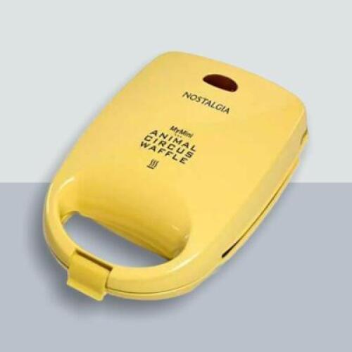 DESCRIPTION: (1) MY MINI ELECTRIC ANIMAL CIRCUS WAFFLE MAKER BRAND/MODEL: NOSTALGIA/MANWFL4YW INFORMATION: 4-ANIMAL/YELLOW RETAIL$: $19.95 QTY: 1