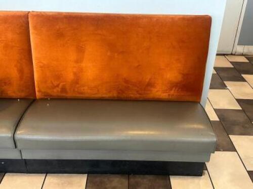 DESCRIPTION APPROX 36' OF BOOTH SEATING. GREY VINYL SEATS W/ DARK ORANGE FABRIC BACKING. ADDITIONAL INFORMATION 7 SECTIONS. LOCATION SEATING QTY 1