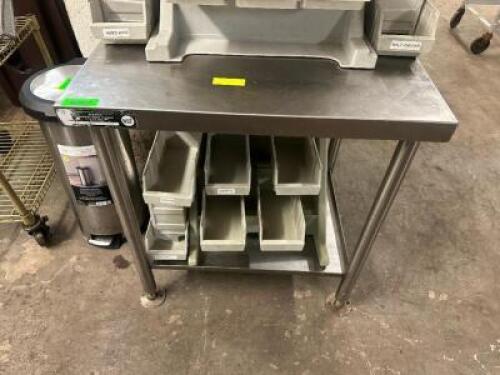 24" X 30" STAINLESS TABLE.