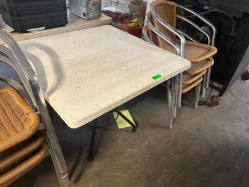 36" X 36" WHITE COMPOSITE PATIO TABLE W/ (4) WICKER PATIO CHAIRS.