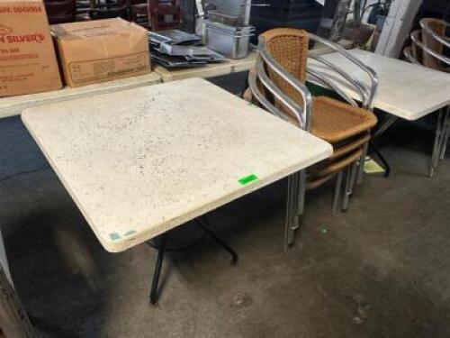 36" X 36" WHITE COMPOSITE PATIO TABLE W/ (4) WICKER PATIO CHAIRS.