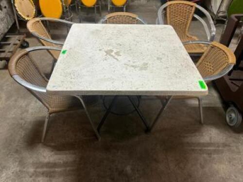 36" X 36" WHITE COMPOSITE PATIO TABLE W/ (4) WICKER PATIO CHAIRS.