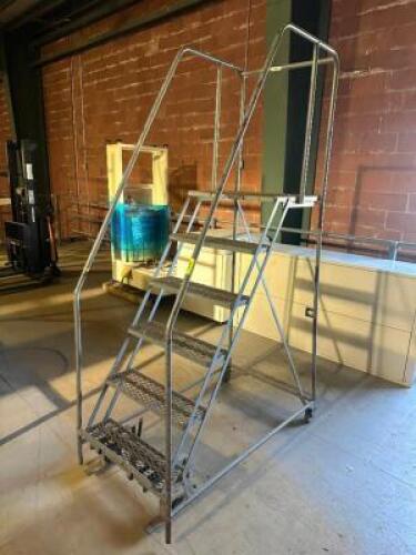 SEVEN STEP ROLL ABOUT STAIR CASE W/ HAND RAIL AND BRAKE.