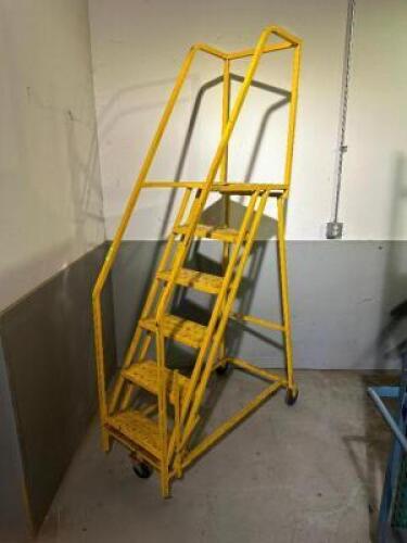 SIX STEP ROLL ABOUT STAIR CASE W/ HAND RAIL AND BRAKE.
