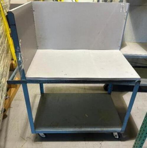 TWO TIER METAL UTILITY CART W/ BACK AND SIDE PANELS.