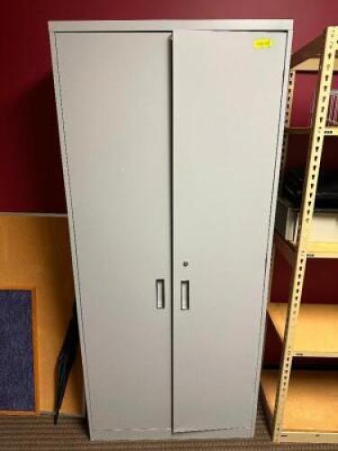 TWO DOOR METAL STORAGE CABINET.