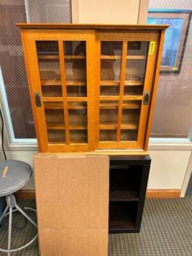 30" X 30" TWO DOOR SLIDING DOOR CABINET W/ GLASS INSERTS.
