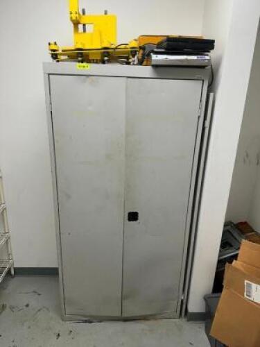TWO DOOR METAL STORAGE CABINET.