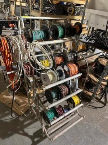 RACKS AND CONTENTS - ASSORTED SPOOLS OR ELECTRICAL WIRING.