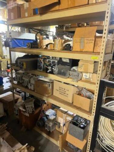 CONTENTS OF SHELF - ASSORTED PARTS AND HARDWARE.