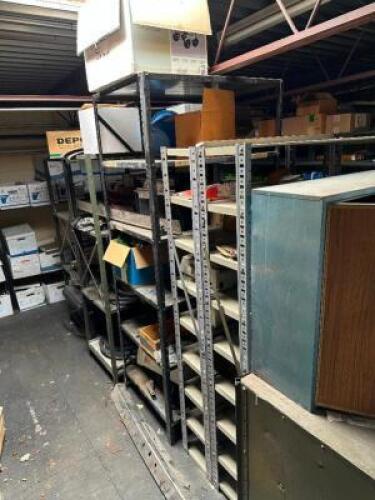 DOUBLE SIDED SHELVING UNIT ROW WITH ASSORTED CONTENTS