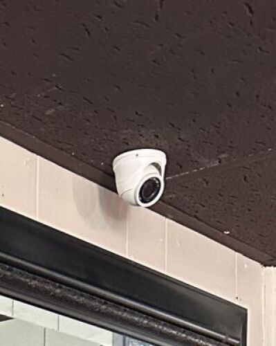 SECURITY SYSTEM WITH CENTRAL BRAIN AND 8 MOUNTED CAMERAS