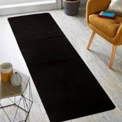 DESCRIPTION: (1) AREA RUG BRAND/MODEL: OLEFIN #W1783 INFORMATION: RICH BLACK SIZE: 24" X 72" RETAIL$: $46.00 EA QTY: 1
