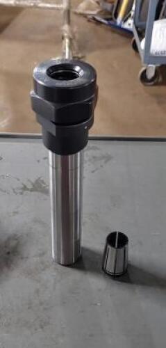 DESCRIPTION: (1) THROUGH COOLANT SINGLE ANGLE COLLET CHUCK BRAND/MODEL: ERIKSON 1025794 SIZE: 2.5" PROJ. 3/64" MIN;3/4: MAX CAP. RETAIL$: $417.56 QTY: