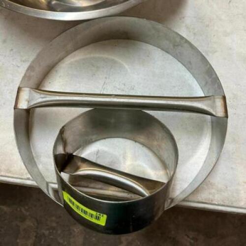DESCRIPTION: (2) STAINLESS DOUGH CUT-OUTS QTY: 2