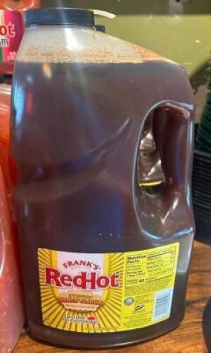 (3) LARGE BOTTLES OF FRANKS RED HOT SAUCE
