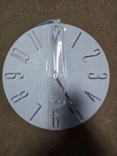DESCRIPTION: (1) WALL CLOCK INFORMATION: GRAY QTY: 1
