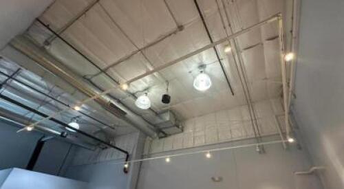 TRACK LIGHTING FIXTURES IN OFFICE AREA