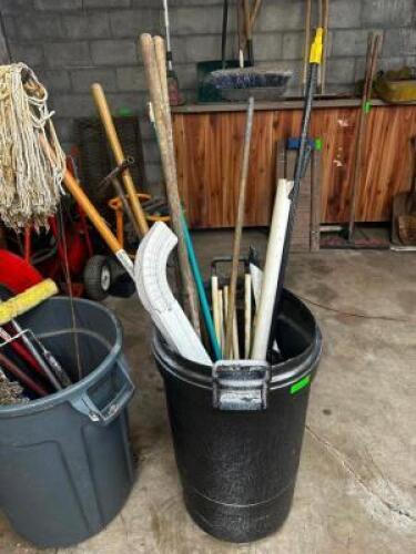 DESCRIPTION TRASH CAN W/ CONTENTS - ASSORTED LONG HANDLES. THIS LOT IS: ONE MONEY QTY 1