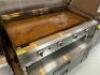 DESCRIPTION SERV-WARE 48" FLAT TOP GRILL. FOUR BURNERS BRAND / MODEL: SERV-WARE ADDITIONAL INFORMATION NATURAL GAS. CHEF BASE NOT INCLUDED SIZE 48" LO - 2