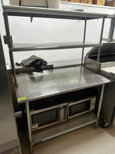 DESCRIPTION 48" X 30" STAINLESS TABLE W/ TWO TIER STAINLESS RISER. SIZE 48" X 30" LOCATION KITCHEN QTY 1
