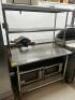 DESCRIPTION 48" X 30" STAINLESS TABLE W/ TWO TIER STAINLESS RISER. SIZE 48" X 30" LOCATION KITCHEN QTY 1