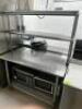 DESCRIPTION 48" X 30" STAINLESS TABLE W/ TWO TIER STAINLESS RISER. SIZE 48" X 30" LOCATION KITCHEN QTY 1 - 3