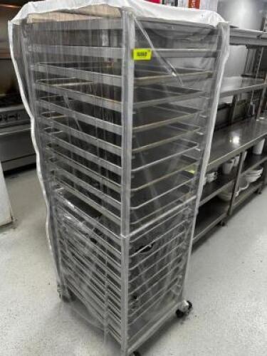 DESCRIPTION TWENTY PAN TRAY RACK W/ CONTENTS ADDITIONAL INFORMATION 20 FULL SIZE TRAYS AND PLASTIC COVER. LOCATION KITCHEN QTY 1