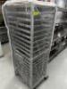 DESCRIPTION TWENTY PAN TRAY RACK W/ CONTENTS ADDITIONAL INFORMATION 20 FULL SIZE TRAYS AND PLASTIC COVER. LOCATION KITCHEN QTY 1