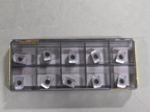 DESCRIPTION: (10) CARBIDE MILLING INSERTS BRAND/MODEL: SANDVIK COROMANT L331.1A-05 45 23H-WL 1040 RETAIL$: $272.00 QTY: 10