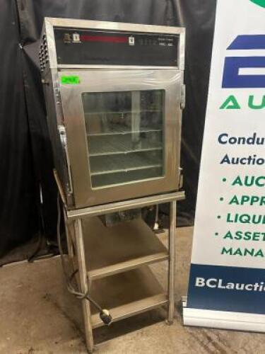 HENNY PENNY PASS THRU HUMIDIFIED HOLDING CABINET W/ STAND.