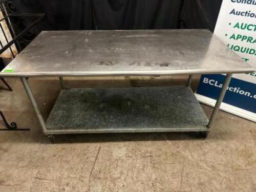 72" X 36" STAINLESS TABLE W/ GALV UNDER SHELF.