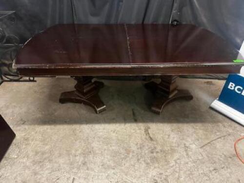76" DARK WOOD DINING ROOM TABLE W/ (2) 18" LEAF INSERTS.