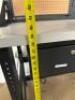 DESCRIPTION: WORKTABLE WITH ELECTRICAL HOOKUPS SIZE: 60"X30" LOCATION: BOTTOM FLOOR QTY: 1 - 4
