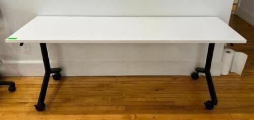 DESCRIPTION: 6' FOLDAWAY TABLE ON CASTERS SIZE: 72"X24"X29" LOCATION: MAIN FLOOR QTY: 1
